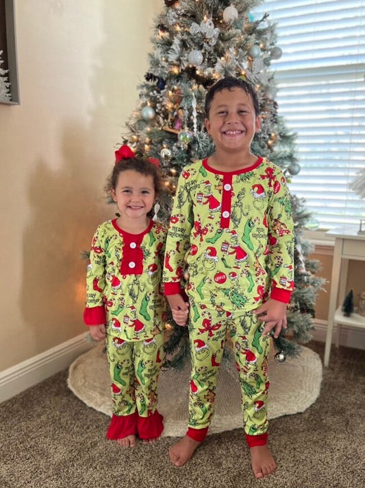 Sibling matching The Grouch Who Stole Christmas pajamas